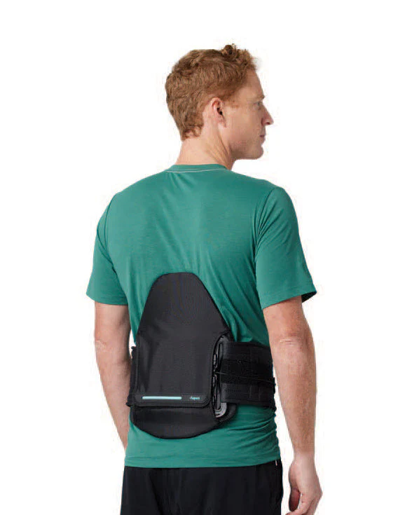 Man wearing a black back brace